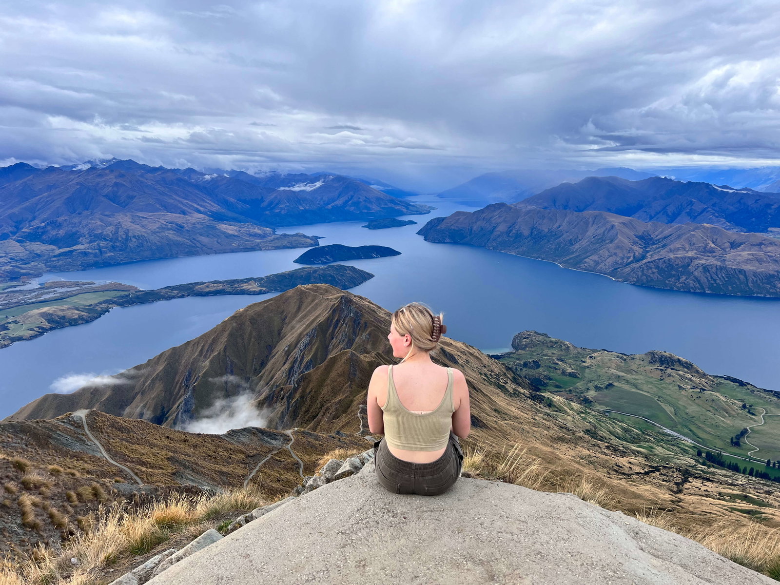 Group traveller looking over New Zealand viewpoint