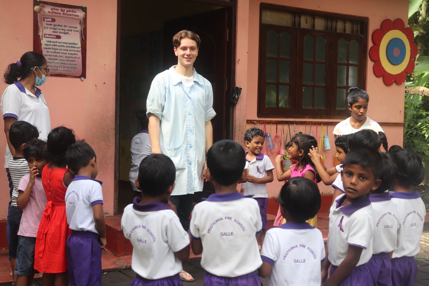 pre school children in Sri Lanka being taught in outside classroom