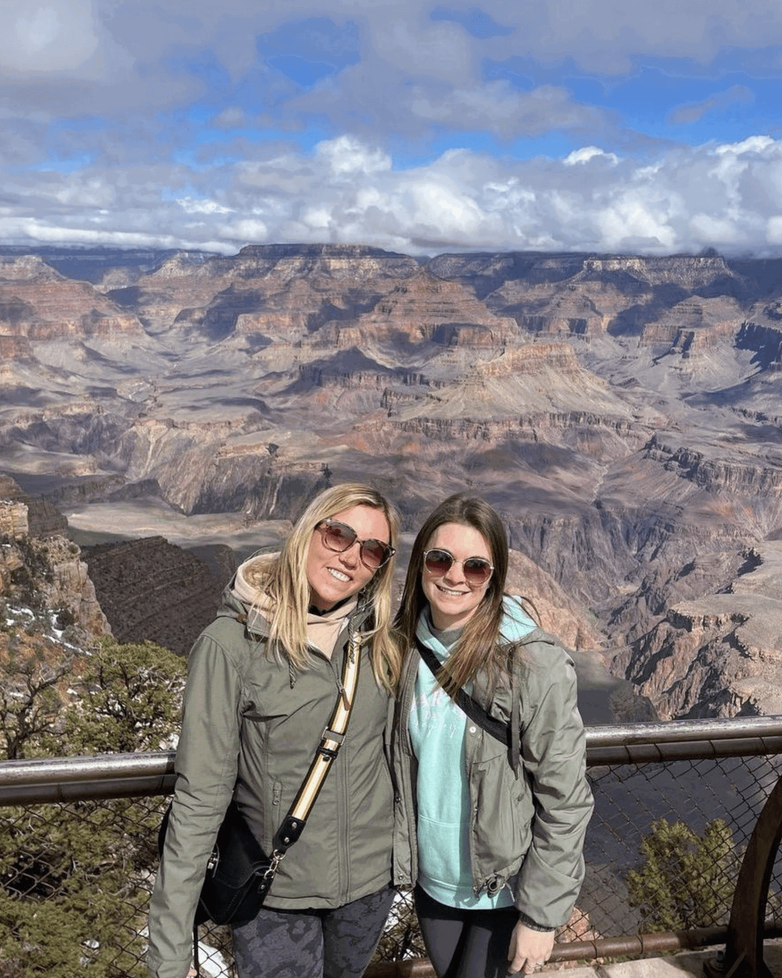 Group travellers at Grand Canyon viewpoint in USA