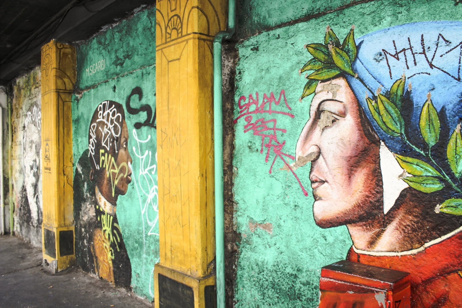 Vibrant street murals on the side of a building