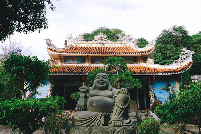Buddha statue in front of a temple in The Marble Mountains in Da Nang, Vietnam