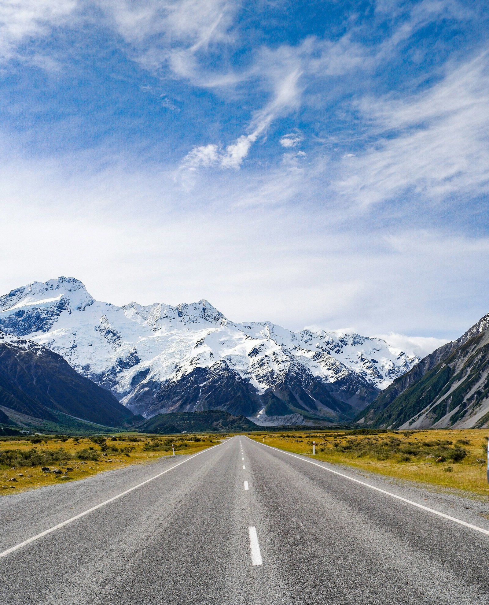 Open road to snowy mountains, Mount Cook National Park