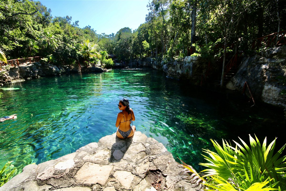 Traveller by Cenote Tortuga in Tulum, Quintana Roo, Mexico 