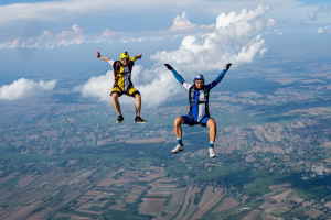 Two travellers skydiving