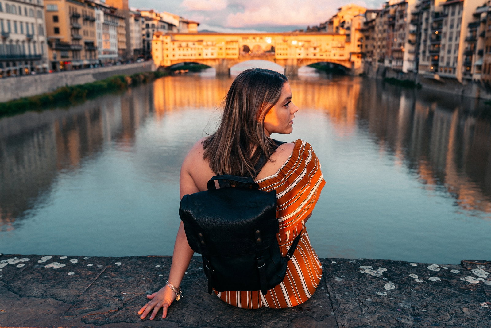 Person on a bridge in Florence, Italy 