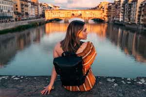 Person on a bridge in Florence, Italy 