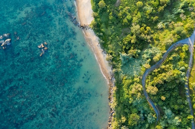 Aerial view of a stone-lined beach in Danang, Vietnam