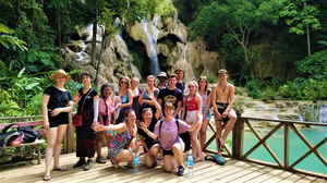 Group travellers at Kuang si waterfall in laos