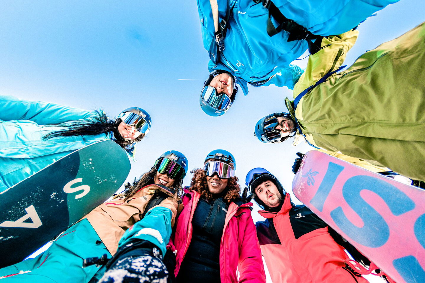 Group of travellers looking down at camera