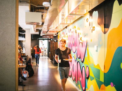 Traveller with food at hostel in europe