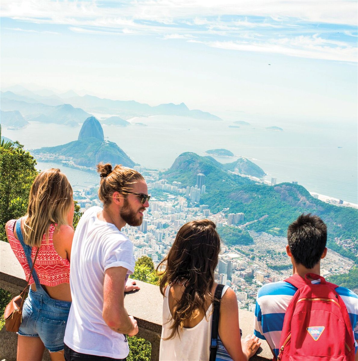 Travellers looking over Rio de Janeiro city in Brazil