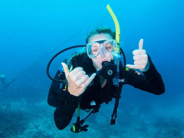 Girl learning to scuba dive