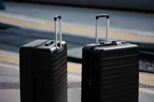 Suitcases on train track 