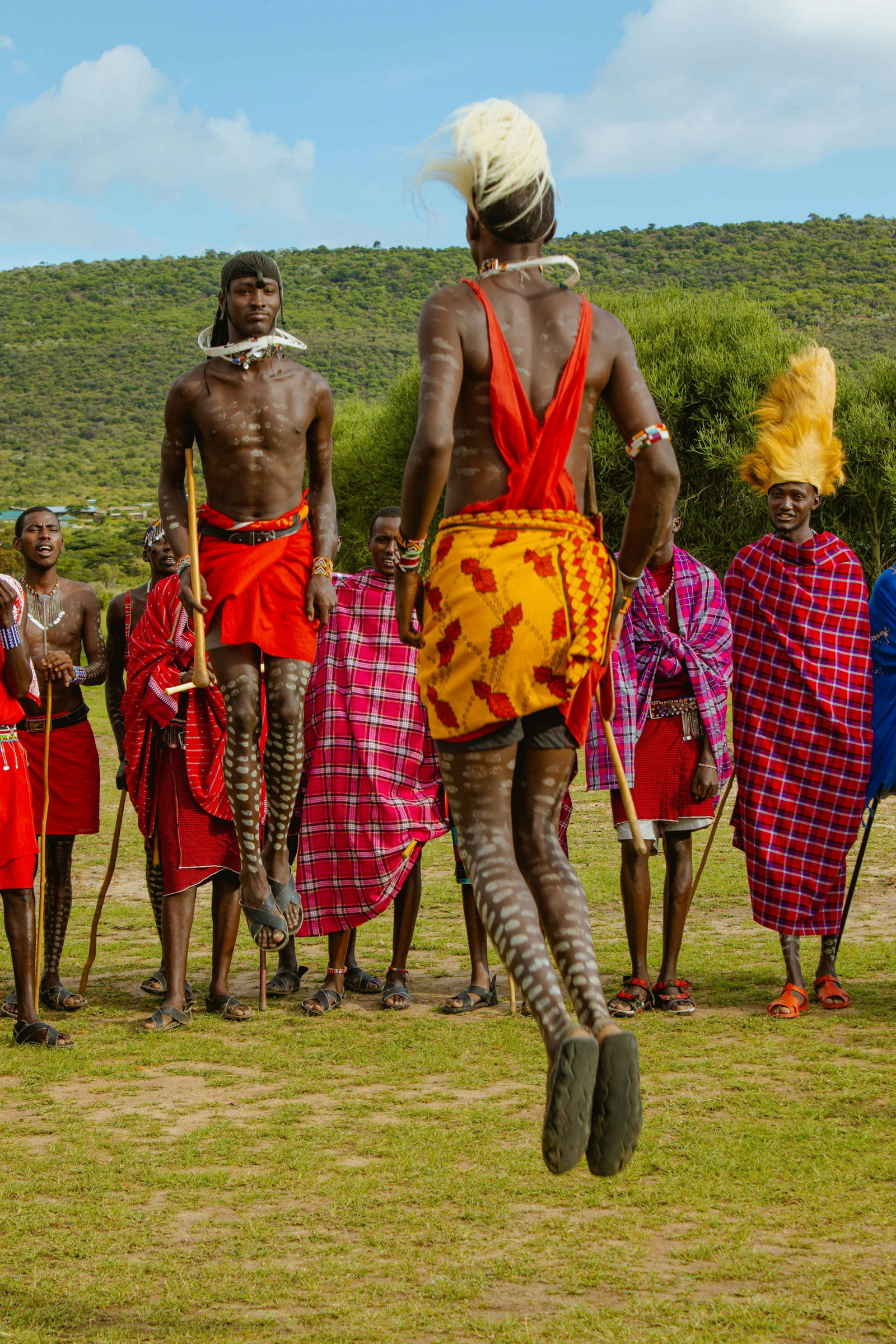 Young men of the Maasai community performing the traditional Adumu jumping dance