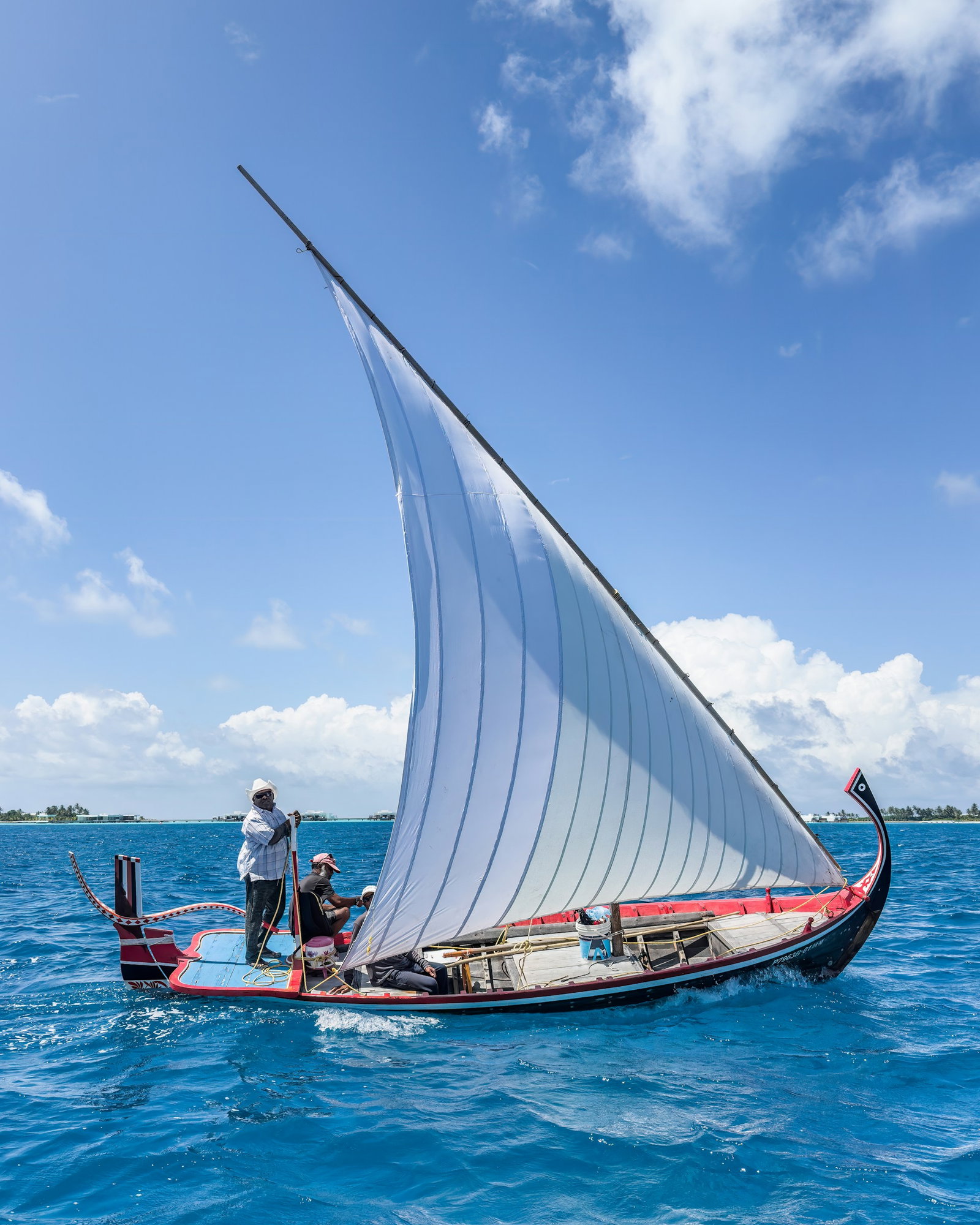 Dhoni boat in Maldives on Blue Water Ocean