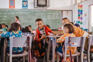 Thai schoolchildren at their desks in a classroom
