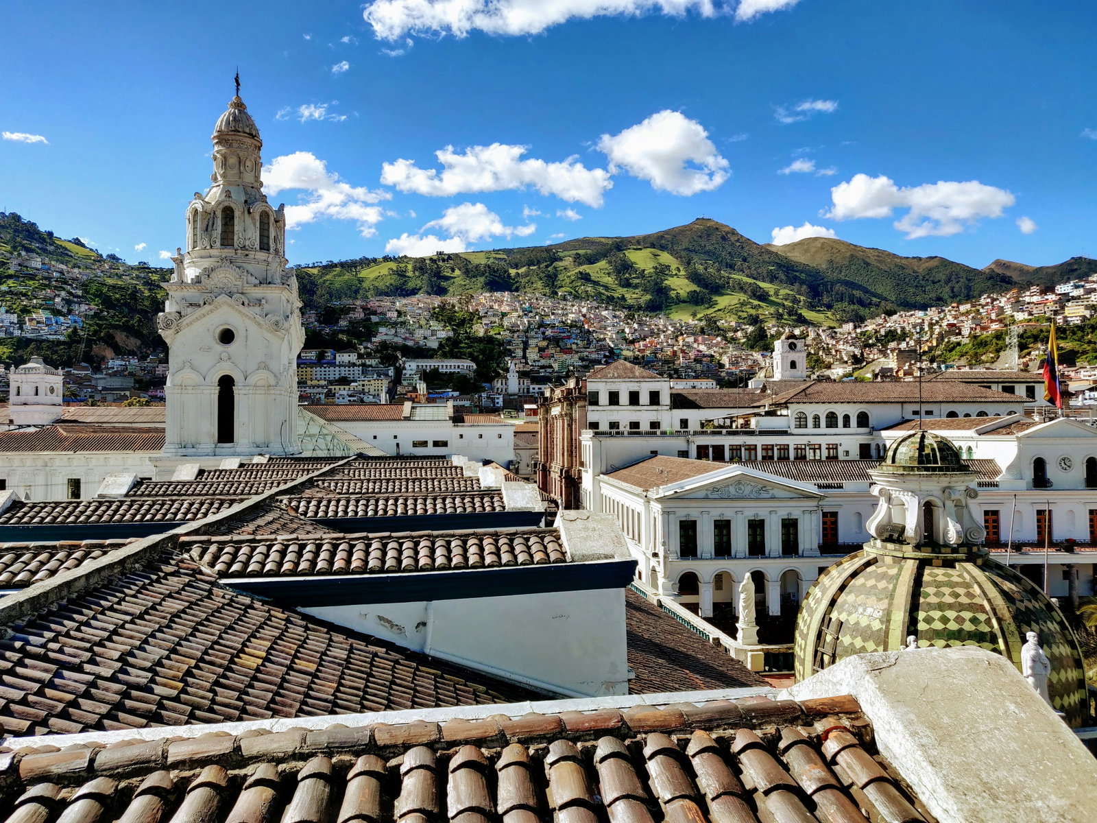 White buildings by mountain view in Quito, Ecuador