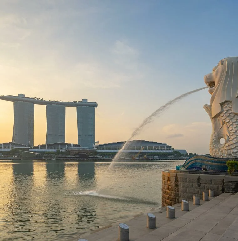 Merlion Park with sunrise in singapore city