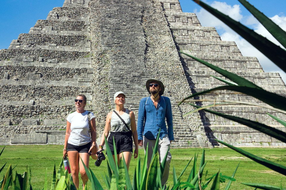 group travellers at chichen itza in mexico