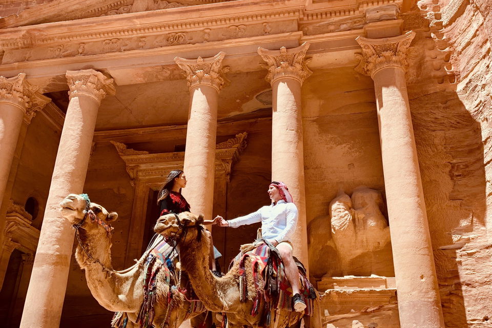 Girl sat on a camel