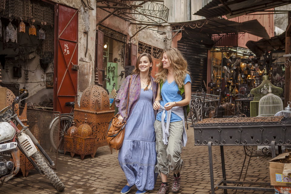 Two girls on a cobbled street in Marrakech