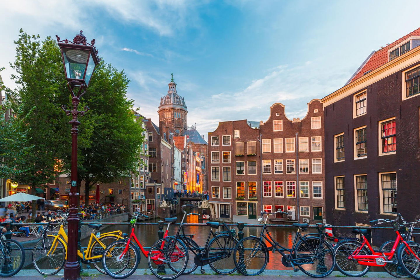 View of bikes on bridge in amsterdam the netherlands