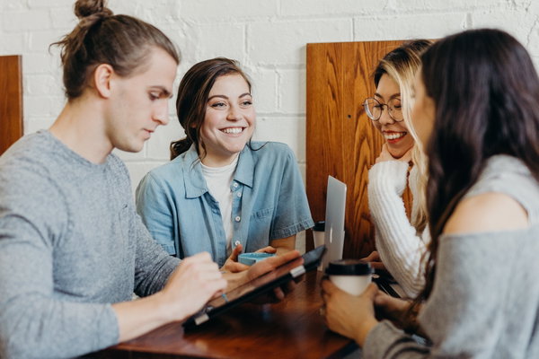 Group of young professionals at work in office