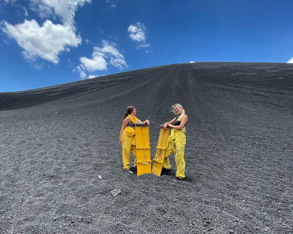 Travellers volcano boarding in Nicaragua
