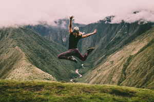 Person jumping in the Andes, the Inca Trail, Peru 