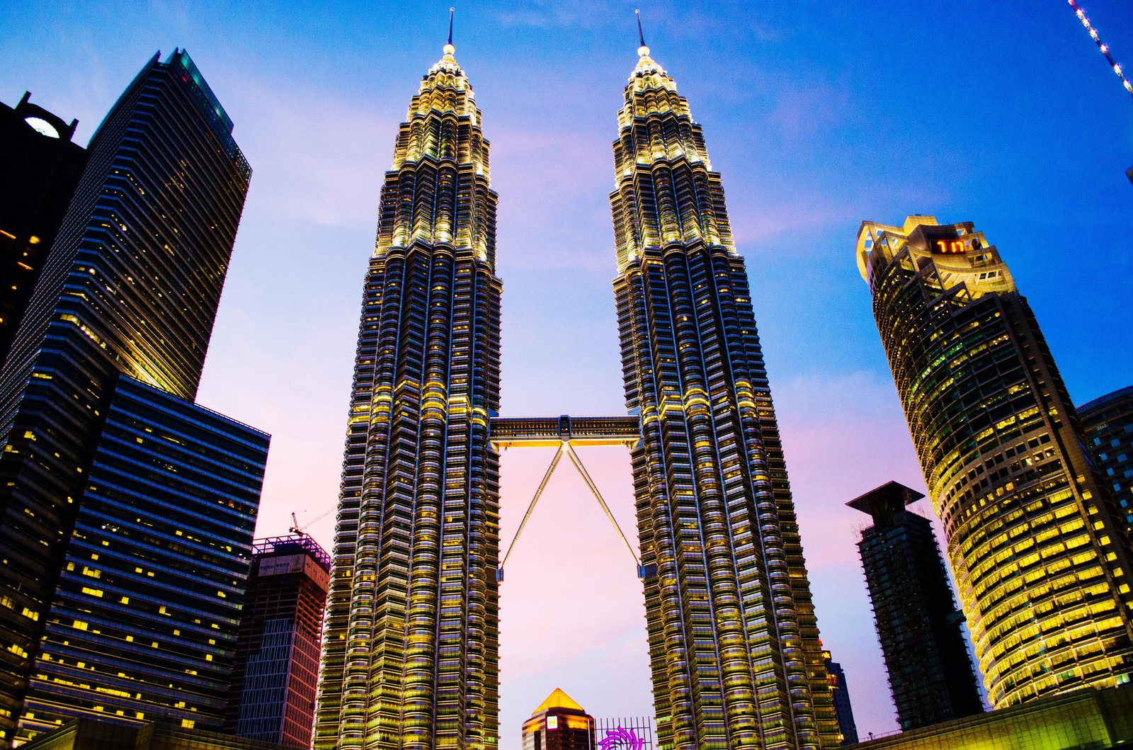 Sunset shot of glistening Petronas Towers in Kuala Lumpur