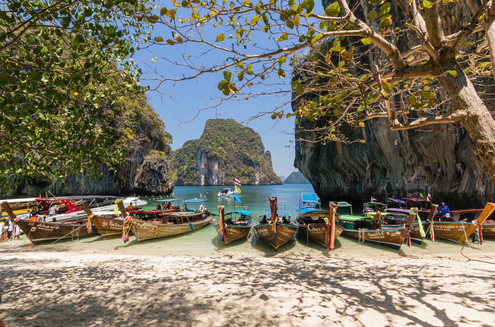 Long-tail boats on beach in Thailand 