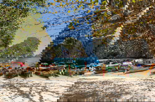 Long-tail boats on beach in Thailand 