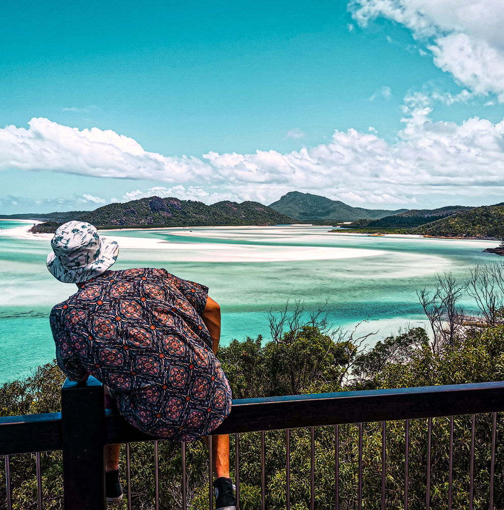 Person looking across Whitsundays from Whitehaven Beach, Australia