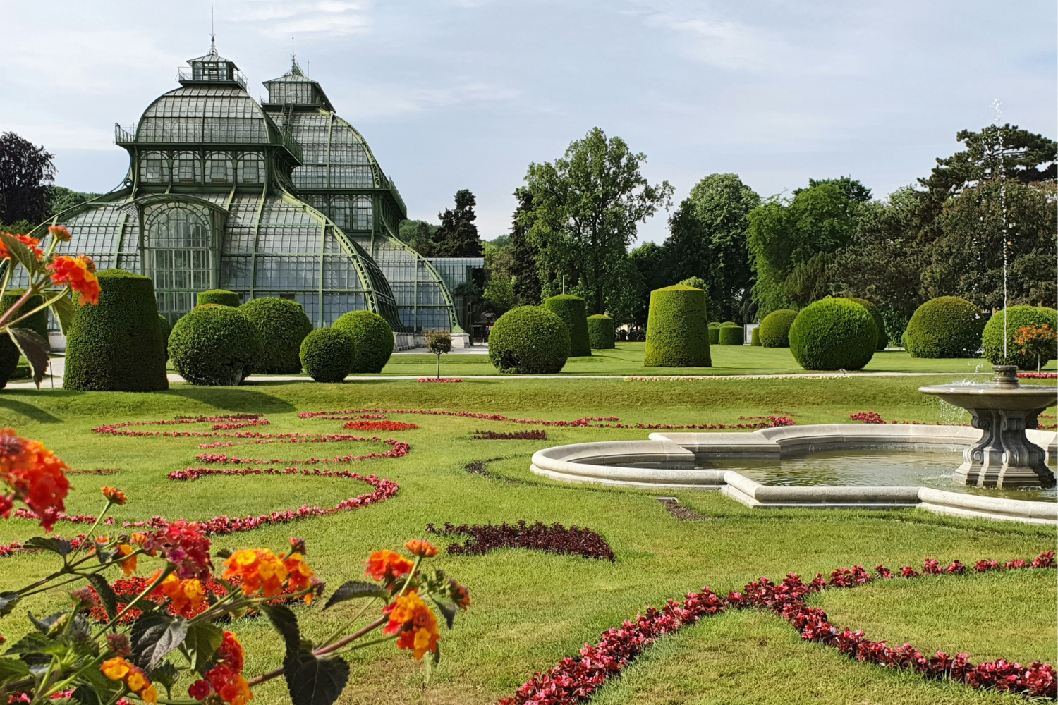 Green gardens at Schonbrunn Palace in Austria