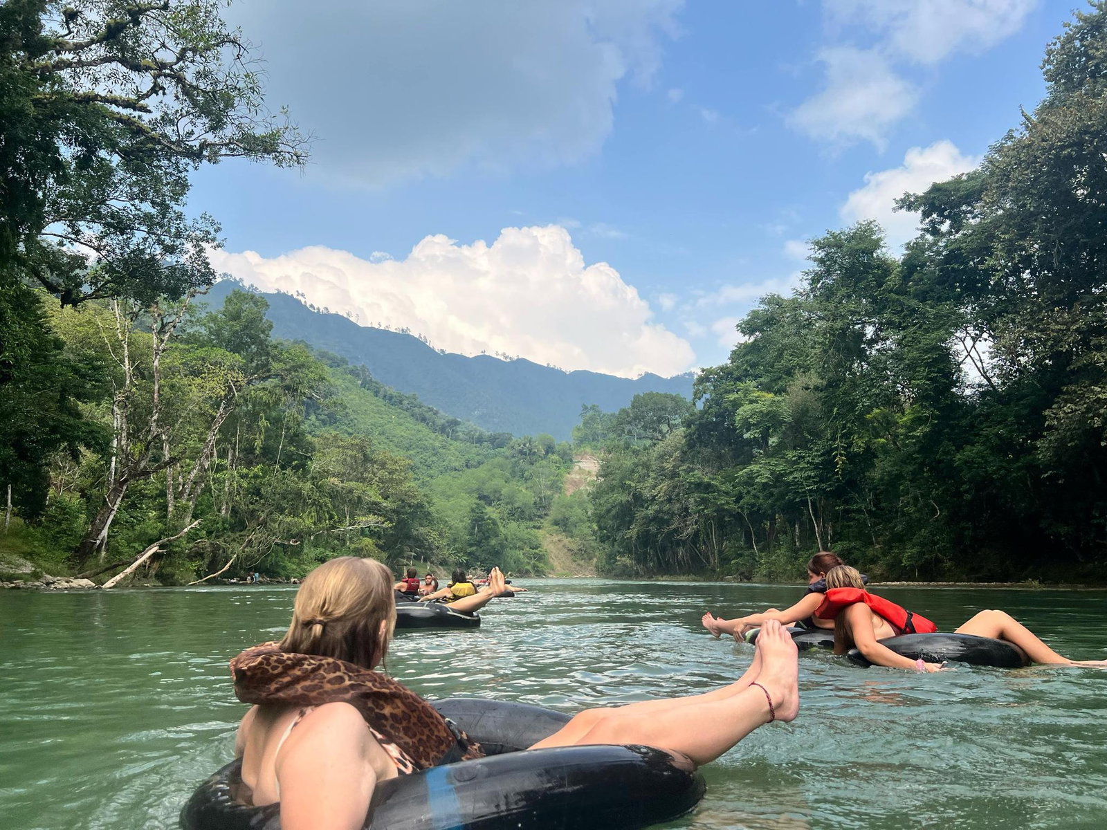 Semuc Champey Group traveller in Tube on River in Guatemala