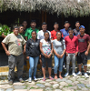 A group of volunteers standing in front of Shandia Lodge in Ecuador