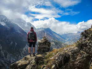 Traveller trekking mountain in Nepal