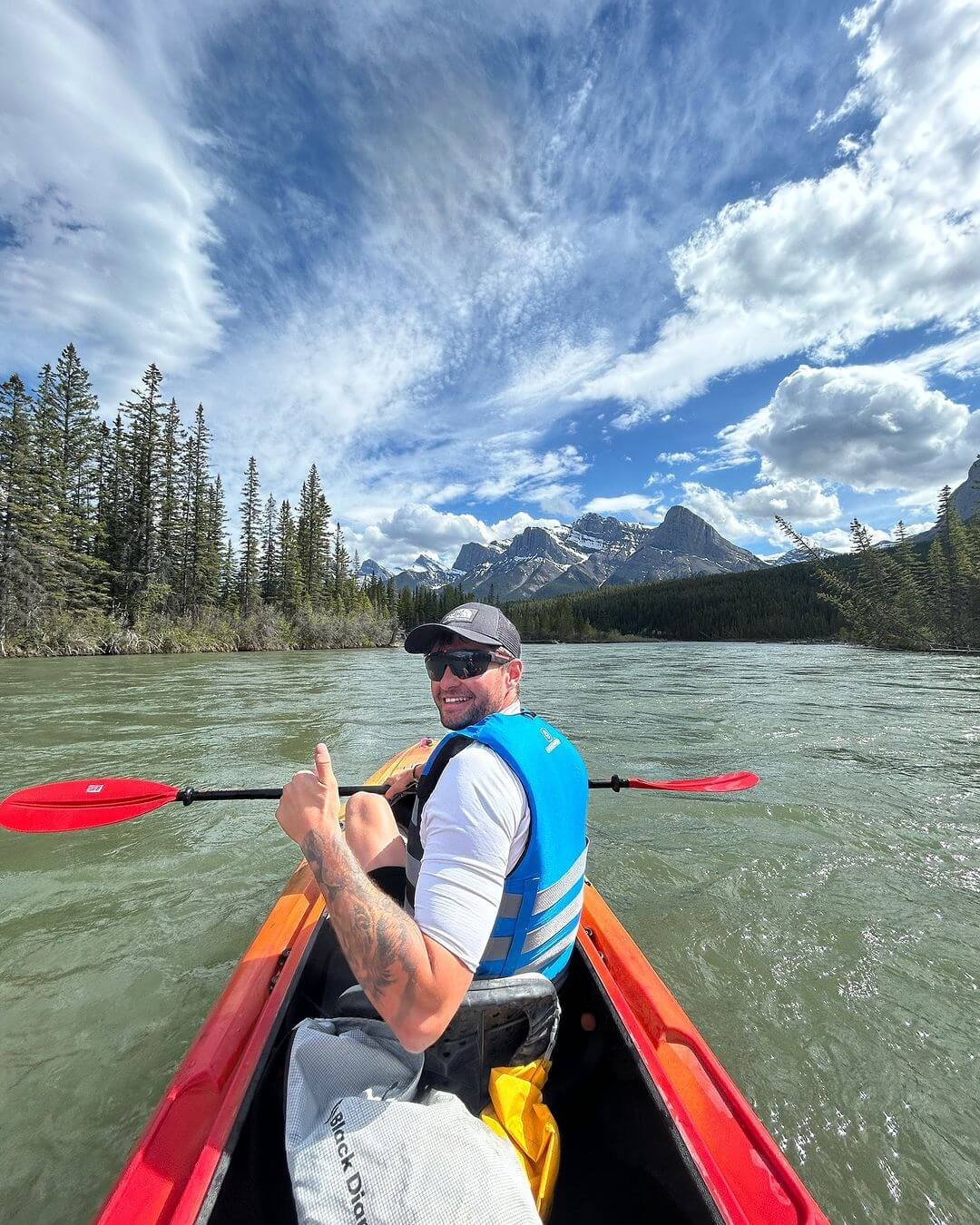 Group traveller on kayak in Canada