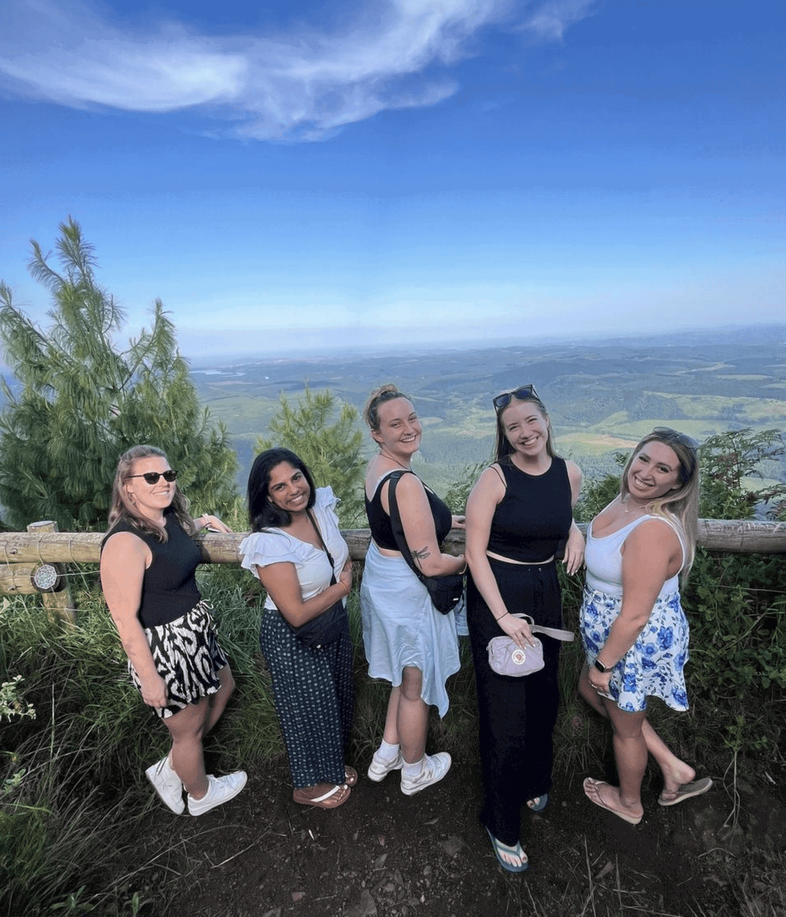 Group travellers in south africa at viewpoint