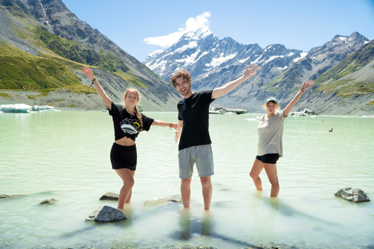 Group in Hooker Valley Glacier in South Island New Zealand