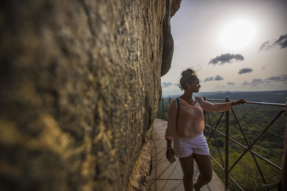 Traveller walking up sigiriya lions rock
