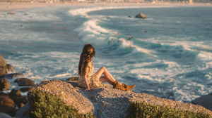 Person looking out to the sea in Cape Town, South Africa