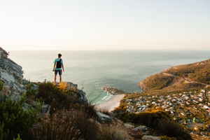 Traveller looking across Cape Town, Llandudno, Cape Town, South Africa
