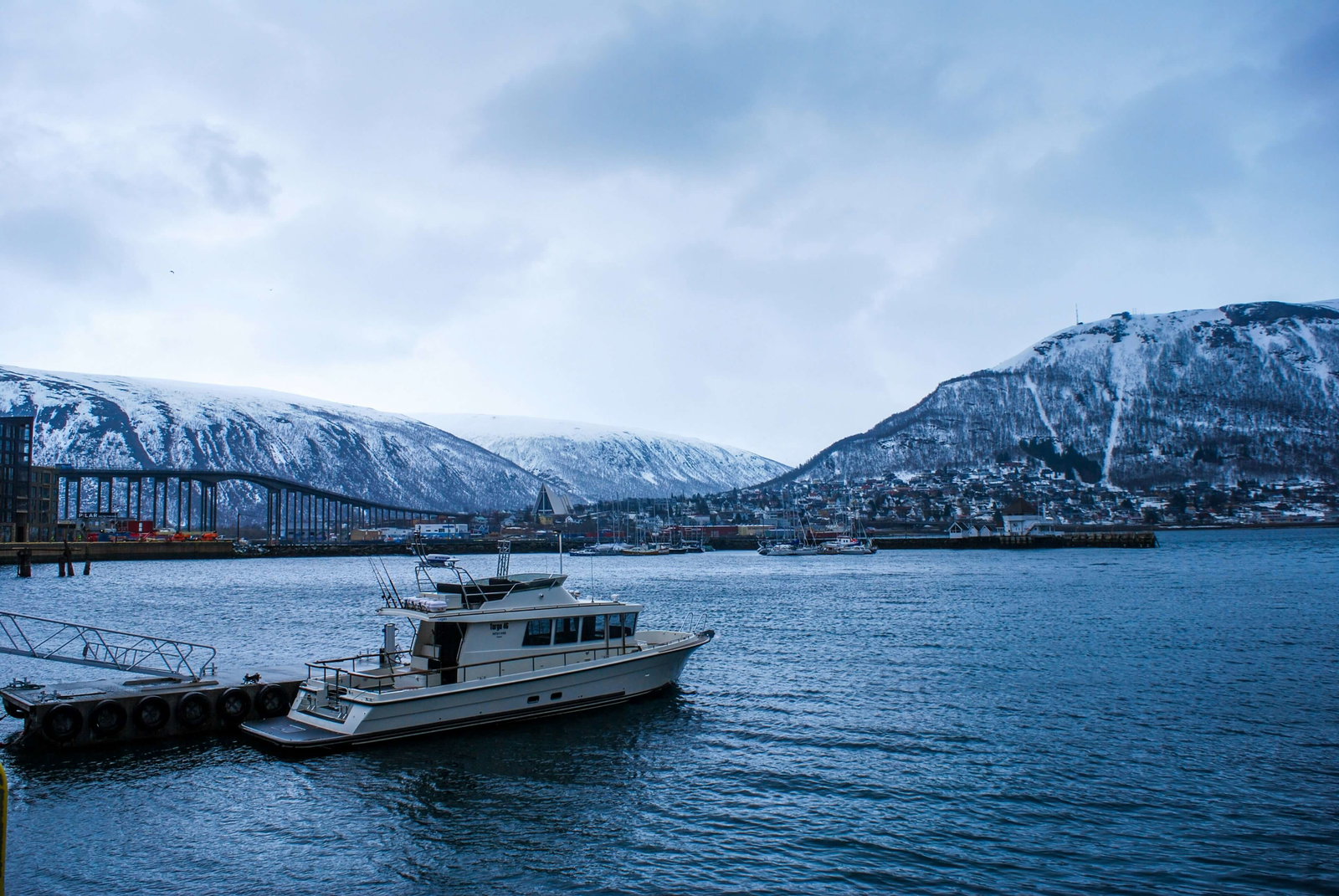 Tromso boat near fjord in norway
