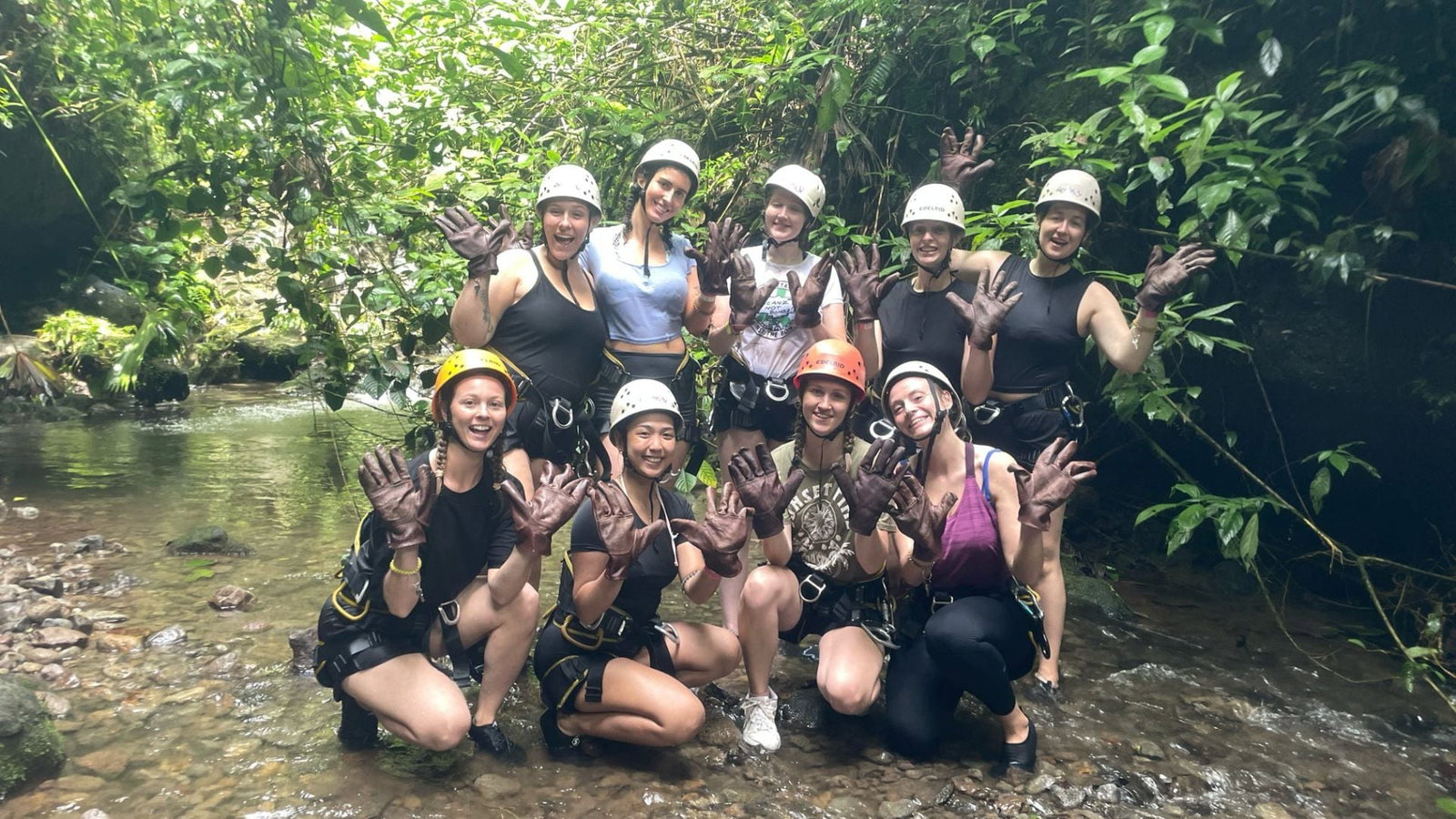 Group of travellers canyoning at La Fortuna