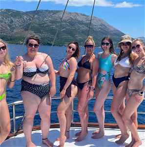 Travellers on sailing boat in Croatia