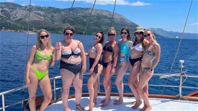 Travellers on sailing boat in Croatia