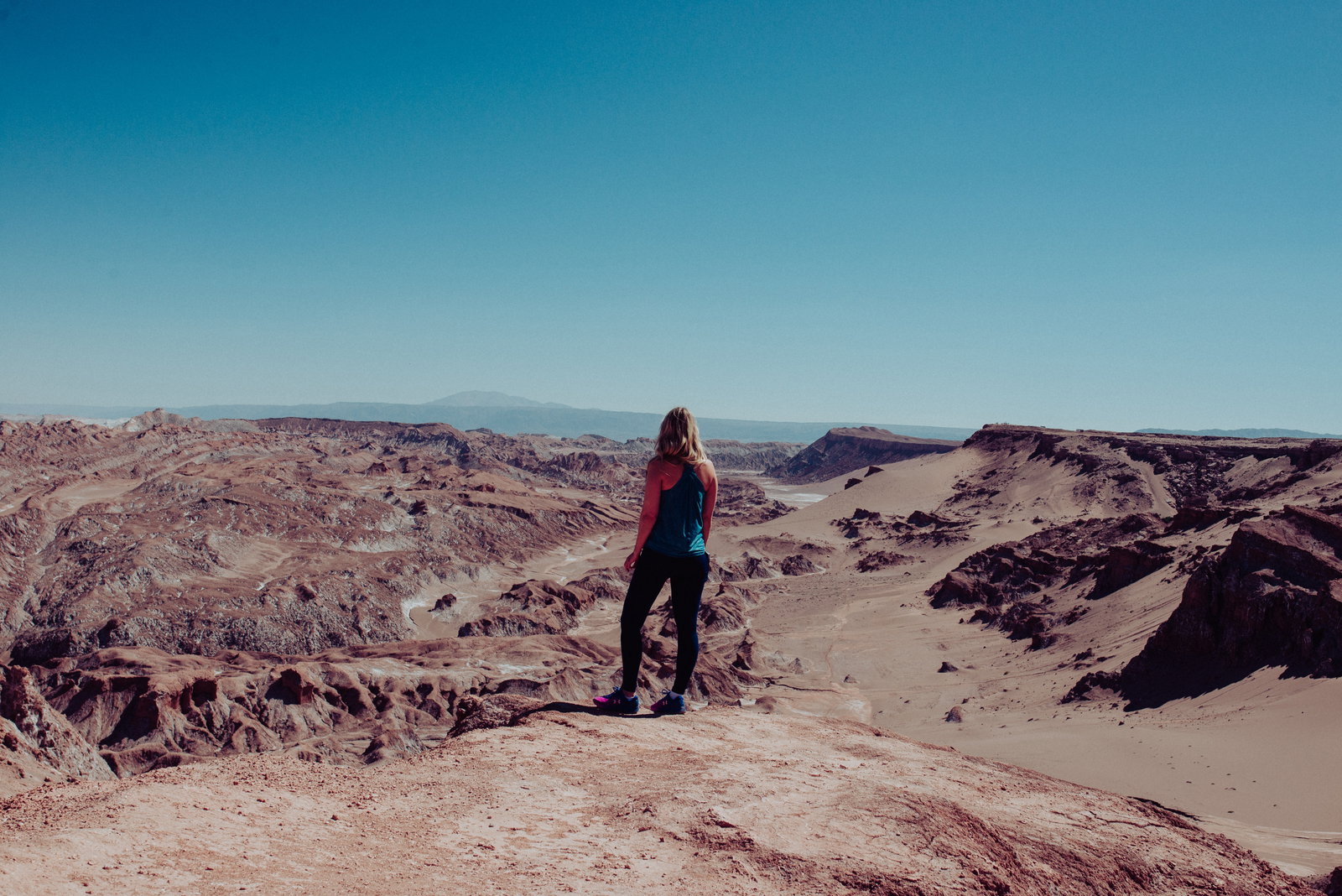 Travellers standing over viewpoint at San Pedro de Atacama, Chile