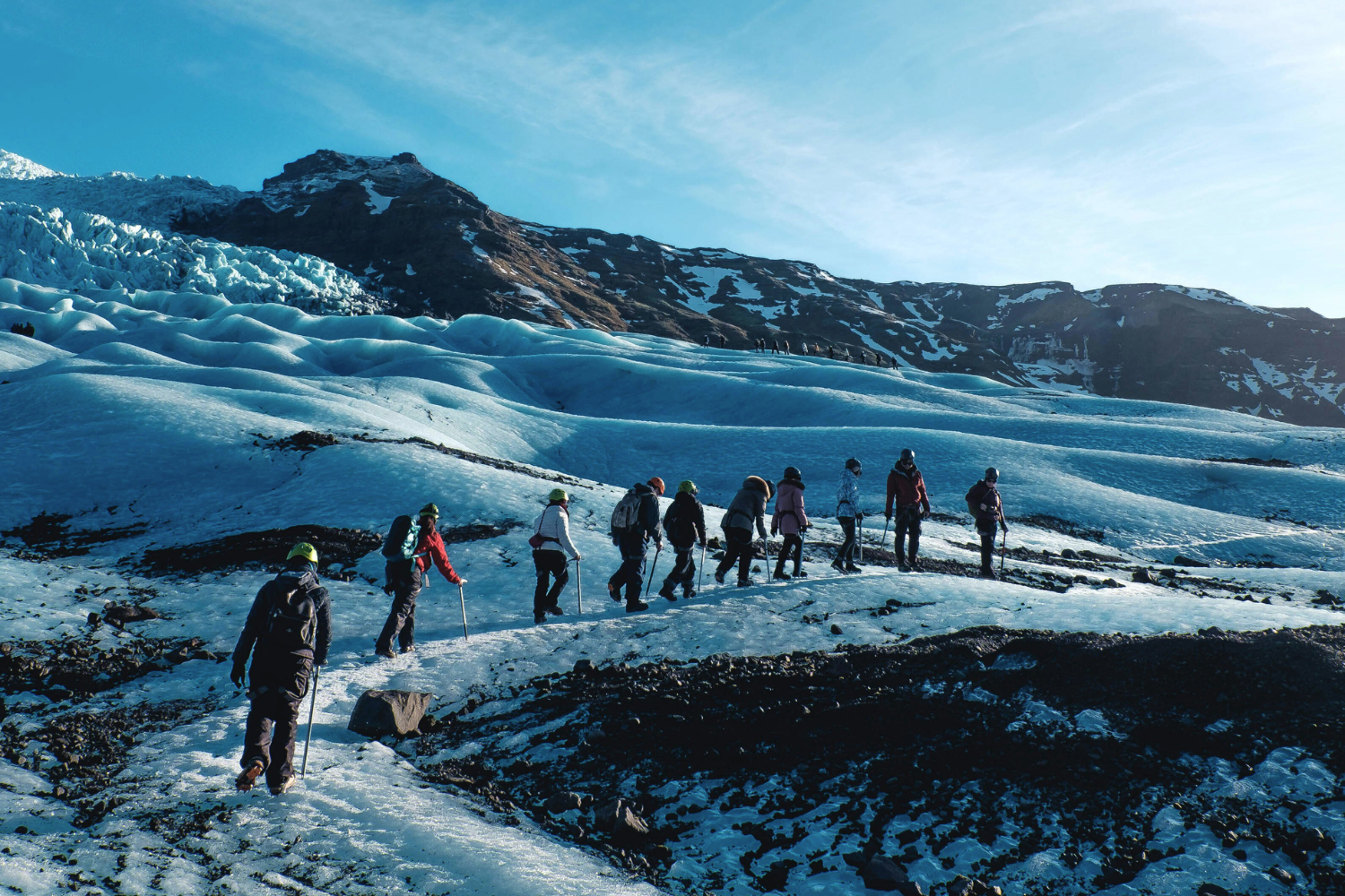 Group of travellers on a glacier trek in Vatnajökull National Park in Iceland