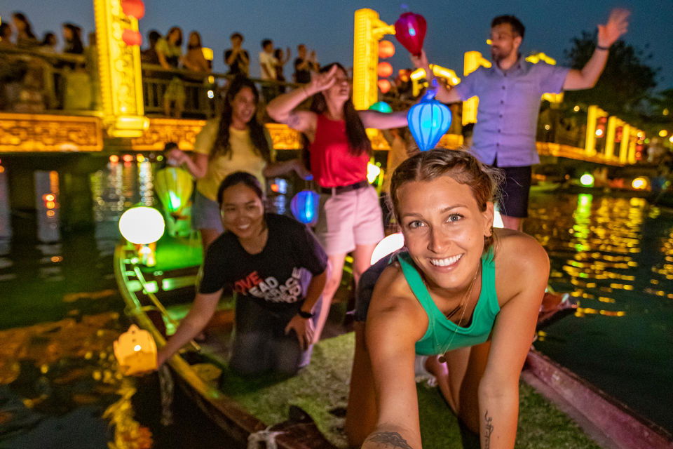 People at Hoi An Night river lantern show in Vietnam